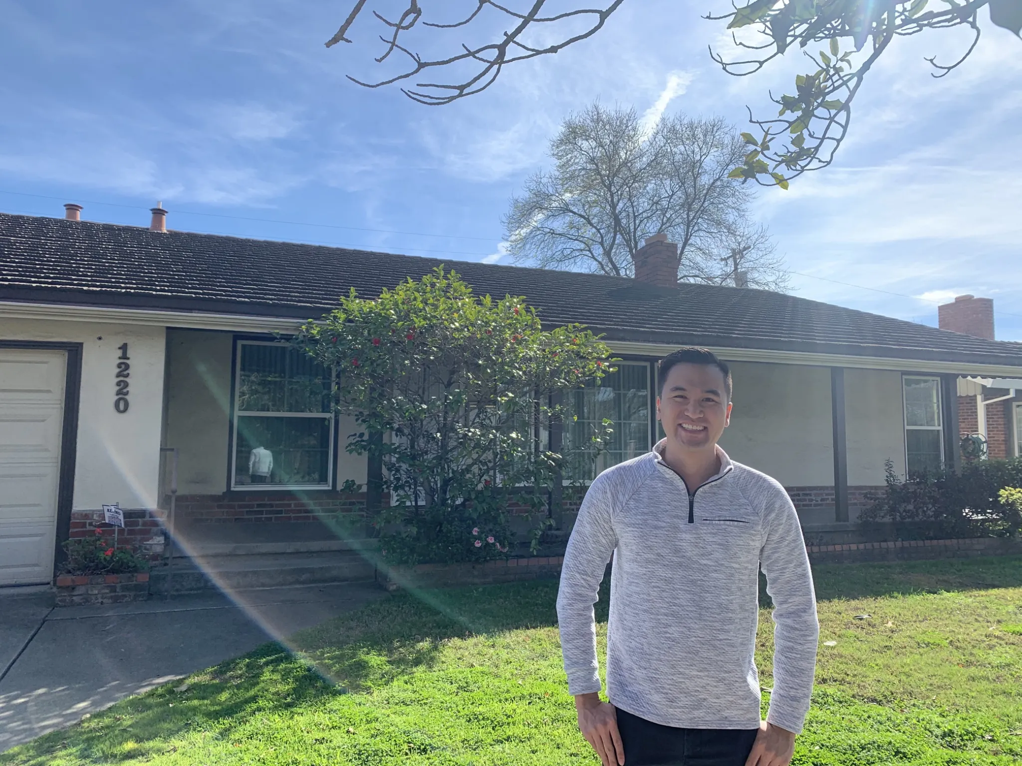 Ryan Chaw in front of California property 