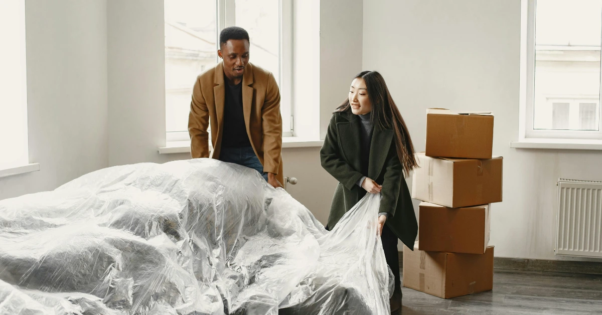 Man and Woman Unpacking in New Home